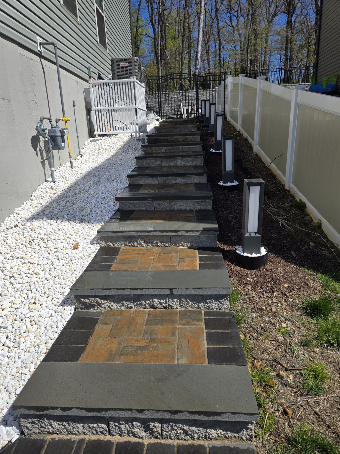 Stone steps with decorative pavers